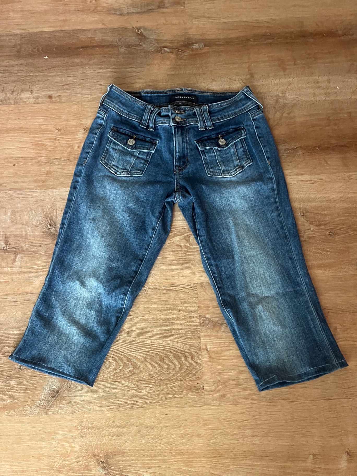 Cropped denim capris reworked from the flared jeans